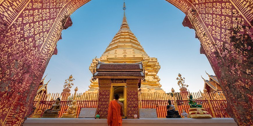 Monk standing at Wat Phra That Doi Suthep temple in Chiang Mai