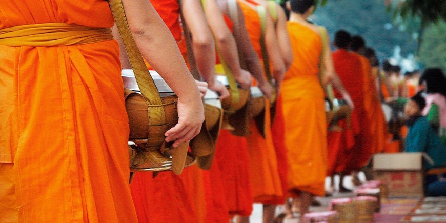 Monks receive alms in Luang Prabang