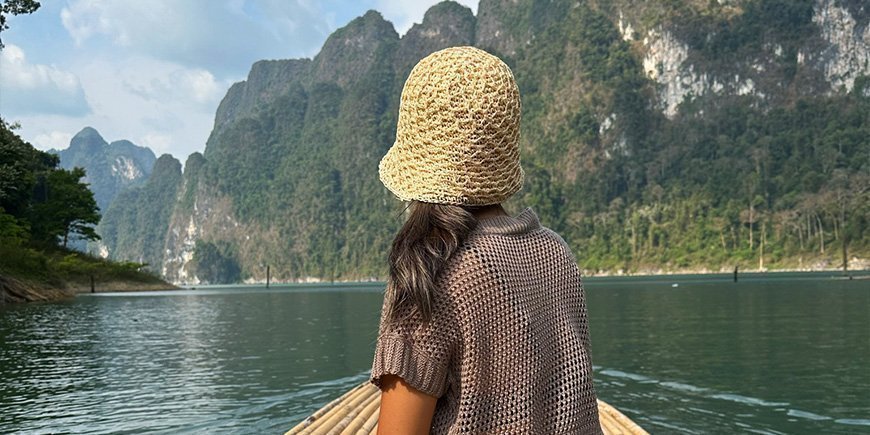 Women sailing on Cheow Lan Lake in Khao Sok National Park in Thailand