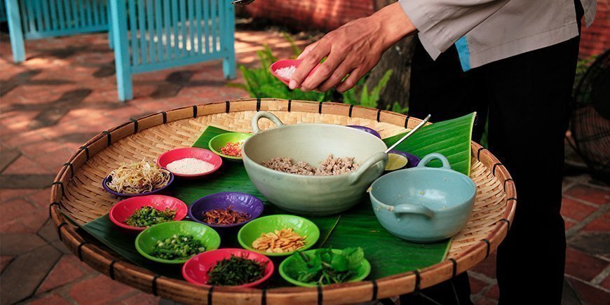 Man making ‘larb’, a traditional dish from Laos