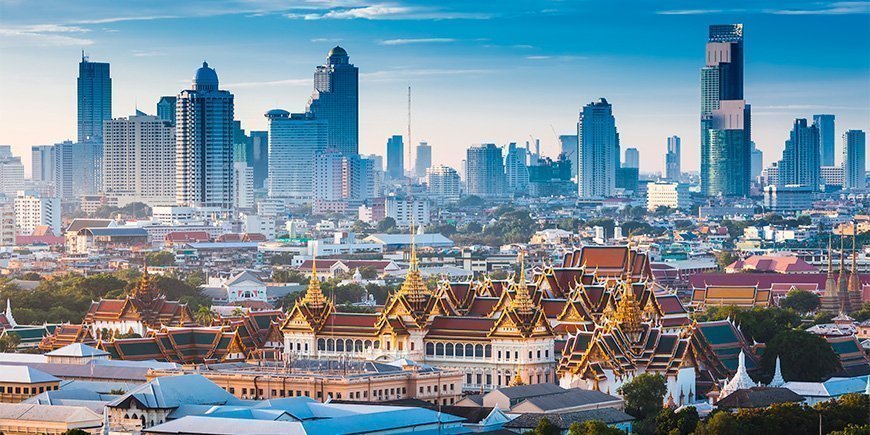 Bangkok skyline with views of skyscrapers and temple