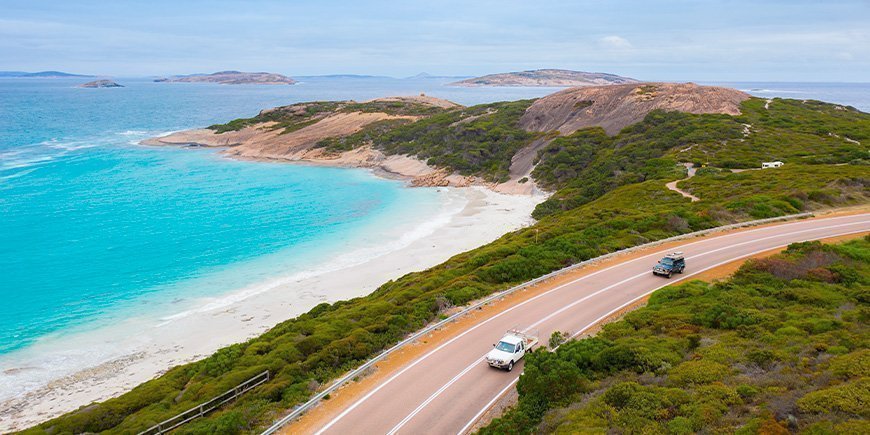 Cars driving on the Great Ocean Road in Australia