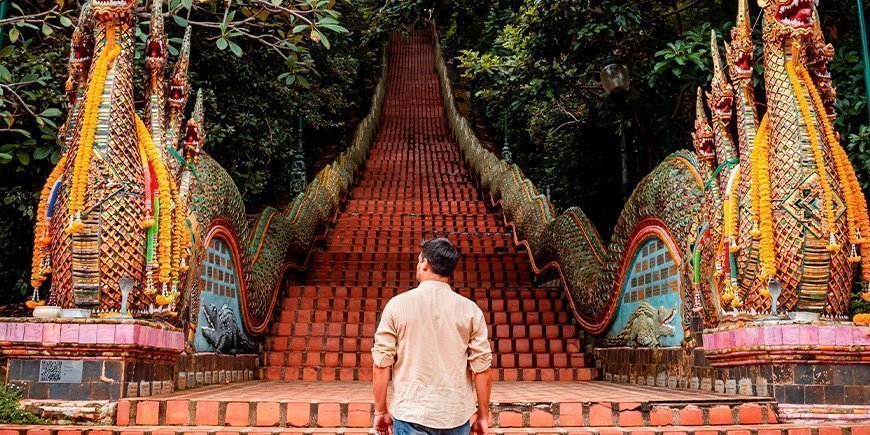 Man walking up stairs at Doi Suethep in Chiang Mai