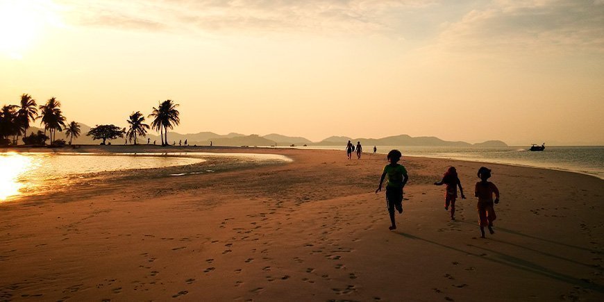 Children playing on the beach on Koh Yao Yai