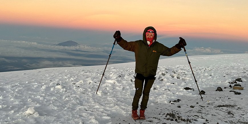 TourCompass travel specialist Cat on the top of Kilimanjaro