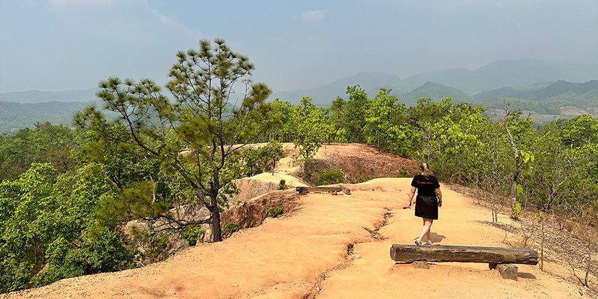 Michelle walks at Pai Canyon