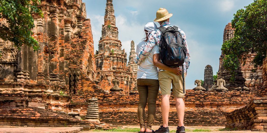 Couple exploring the ruins of Ayutthaya in Thailand