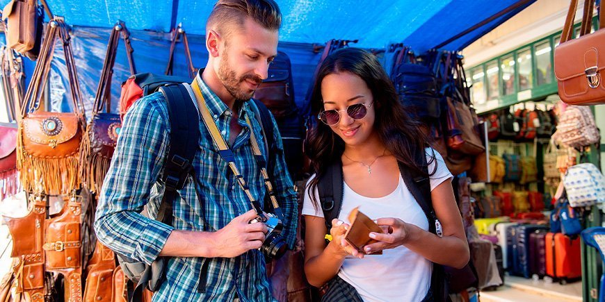 Couple shopping at a market in Bangkok, Thailand,