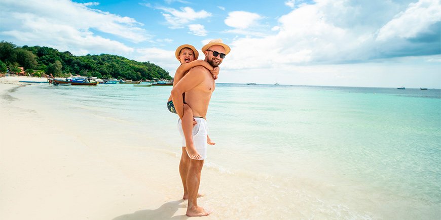 Father and son on a beach in Thailand