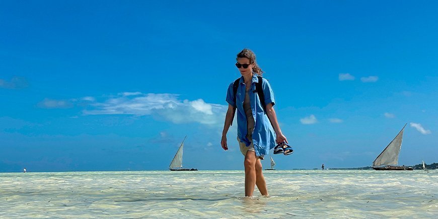 Ingun walking on the beach in Paje on Zanzibar