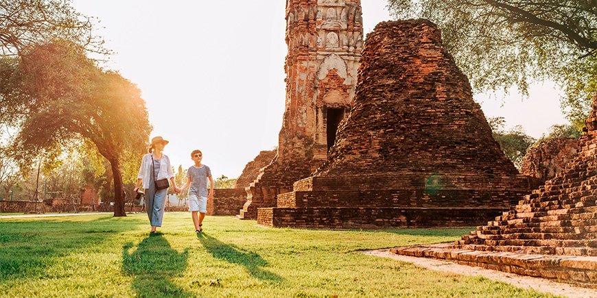 Mother and son walking in Ayutthaya, Thailand